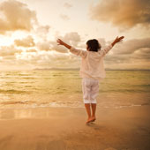 Image of blissful woman on beach